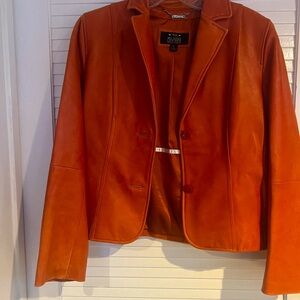 Orange, leather jacket, blazer style from Wilson’s leather in great quality.